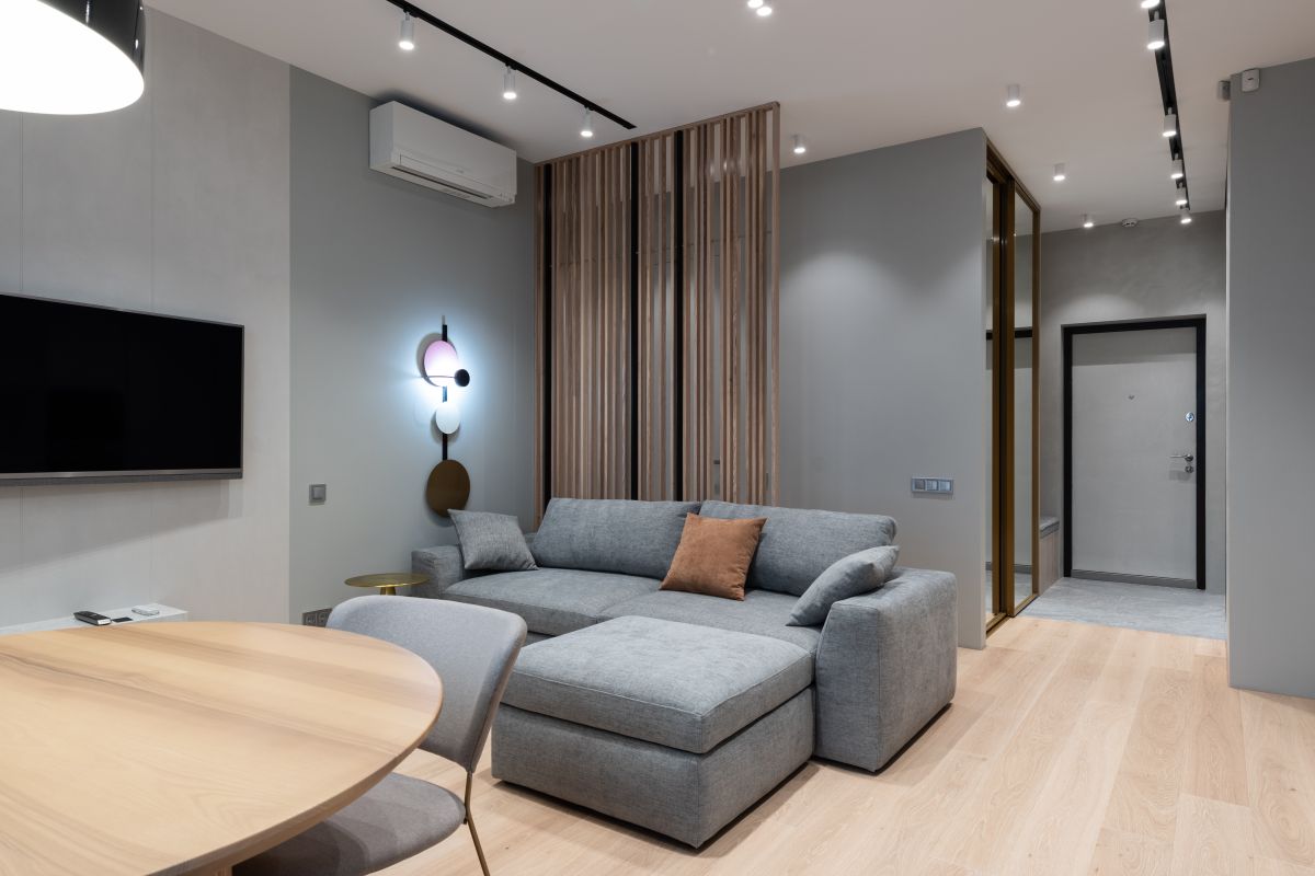 Contemporary living room with a wall-mounted split air conditioner